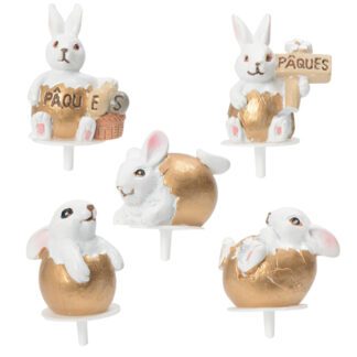 Lapins or : 200 pièces Sur pique en plastique Dimensions hors pique : H. entre 3,1 et 3,6 cm Matière : résine Couleur : blanc et doré Référence : 1107 Décors pâtissiers - Déco gâteaux - Thème : Pâques - Mondo Déco entreprise française