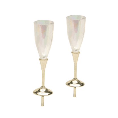 Flûtes de Champagne : 144 pièces Sur pique en plastique Dimensions hors pique : H.5,5 cm Matière : plastique Couleur : doré, transparent nacré Référence : 482 Thème : Amour, anniversaire, intemporel Décors pâtissiers, décors pour gâteaux - Mondo Déco entreprise française